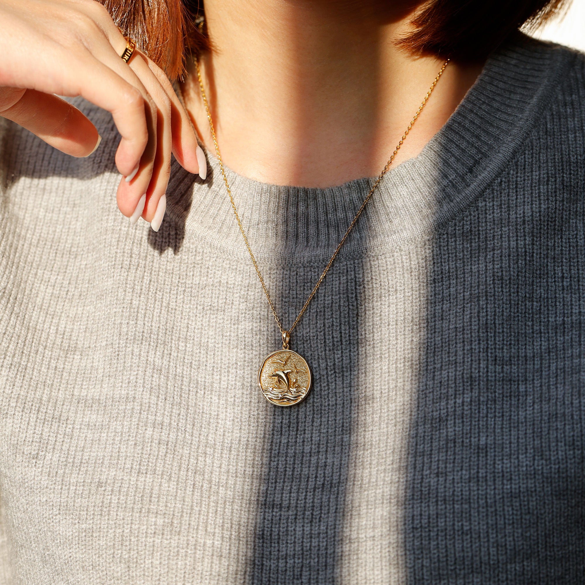 Collier avec pendentif dauphin danse de l'océan Promised Land